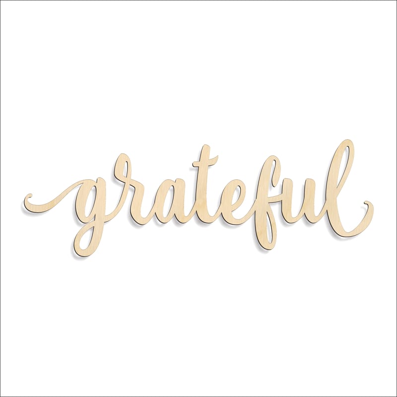 Laser-cut baltic birch silhouette of GRATEFUL SCRIPT